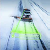 Snow plow truck clearing highway with neon green detection zone overlay during winter storm