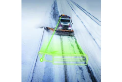 Snow plow truck clearing highway with neon green detection zone overlay during winter storm