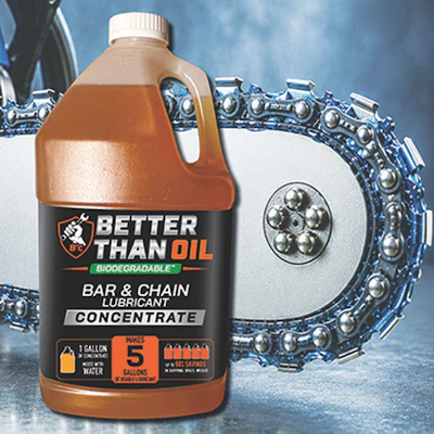 Better Than Oil biodegradable bar and chain lubricant concentrate gallon bottle with motorcycle chain and blue sky background
