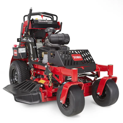 Red and black Toro Grandstand zero-turn commercial lawn mower with dual wheels and engine mounted on deck