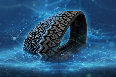 Black tire tread with geometric pattern on digital blue technology background