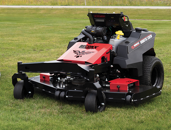 Red and black Gravely zero-turn radius mower on grass field