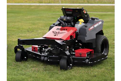 Red and black Gravely zero-turn radius mower on grass field