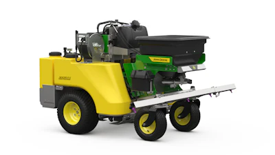 John Deere green and yellow wood chipper with black hopper and white discharge chute