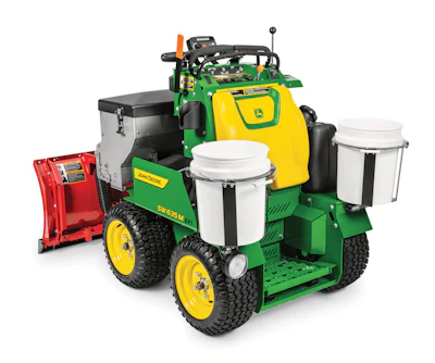 Green and yellow John Deere children's ride-on toy with storage containers and tool box